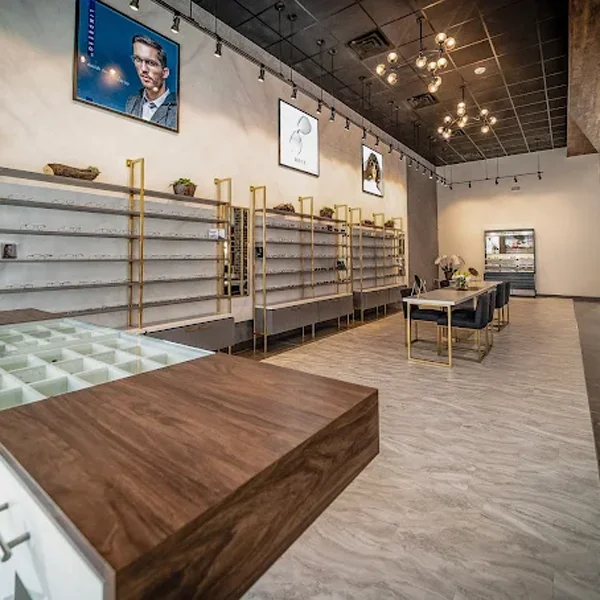 The lobby of Focus Optical, with walls lined with eyeglasses on display
